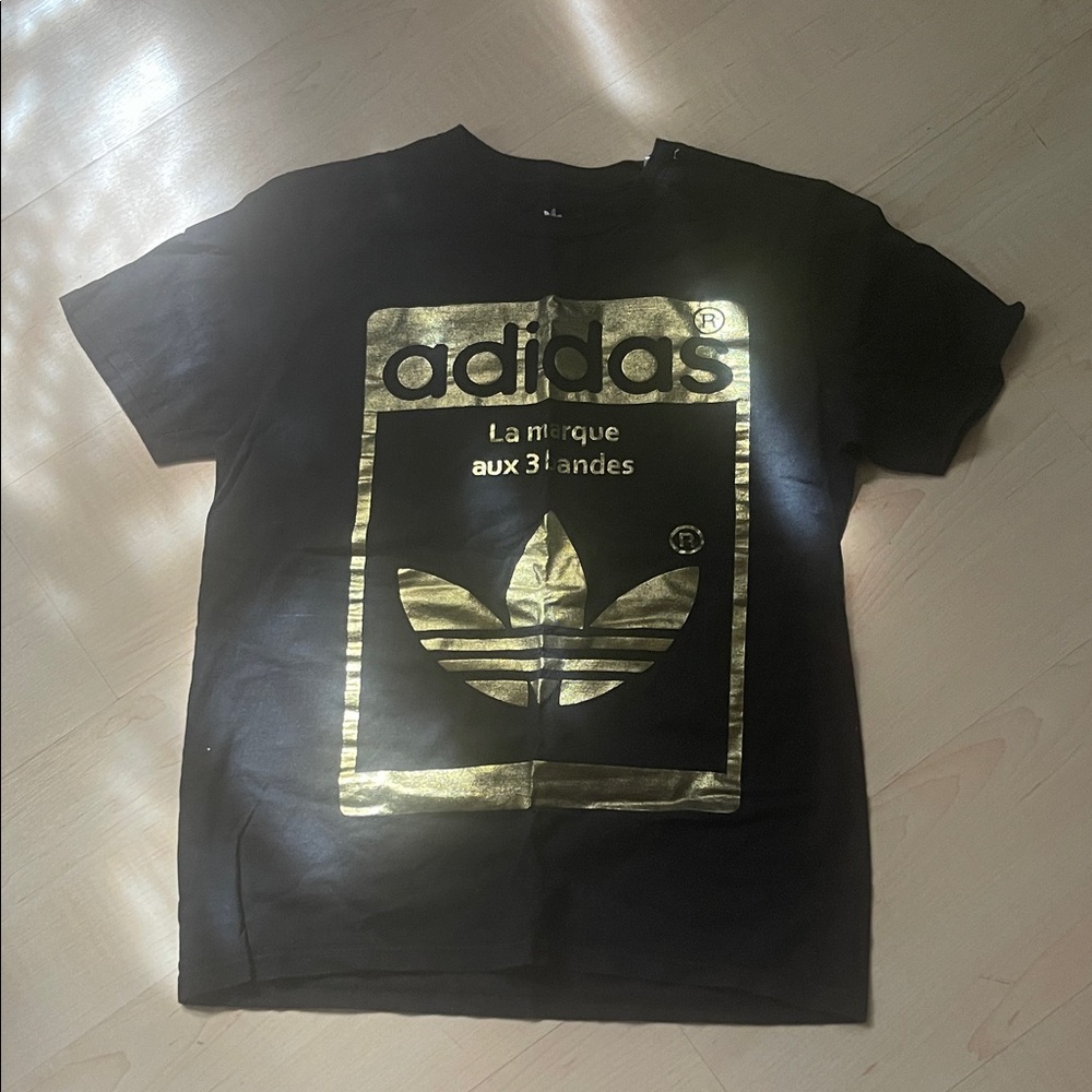 Adidas Black Tee with Gold Graphic